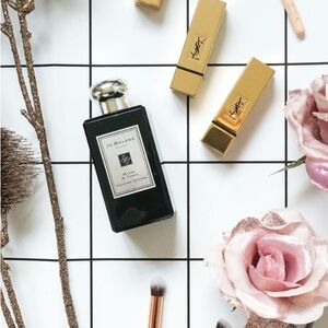 Jo Malone Myrrh and Tonka cologne intense. Receive a free small Jo Malone.